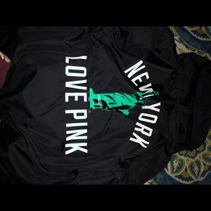 Size large Pink NY lined wind breaker. EUC